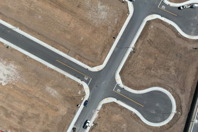 Aerial view of land development and road infrastructure