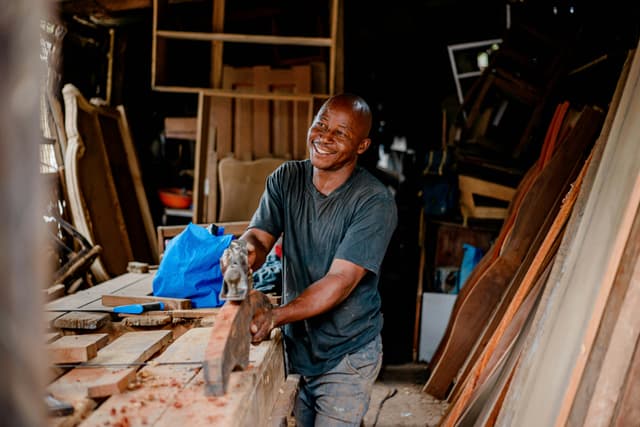 Small business owner working in a woodworking shop